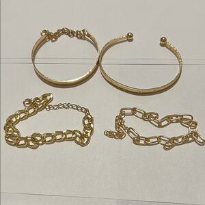 Costume jewelry - 4 pieces-gold colored filigree